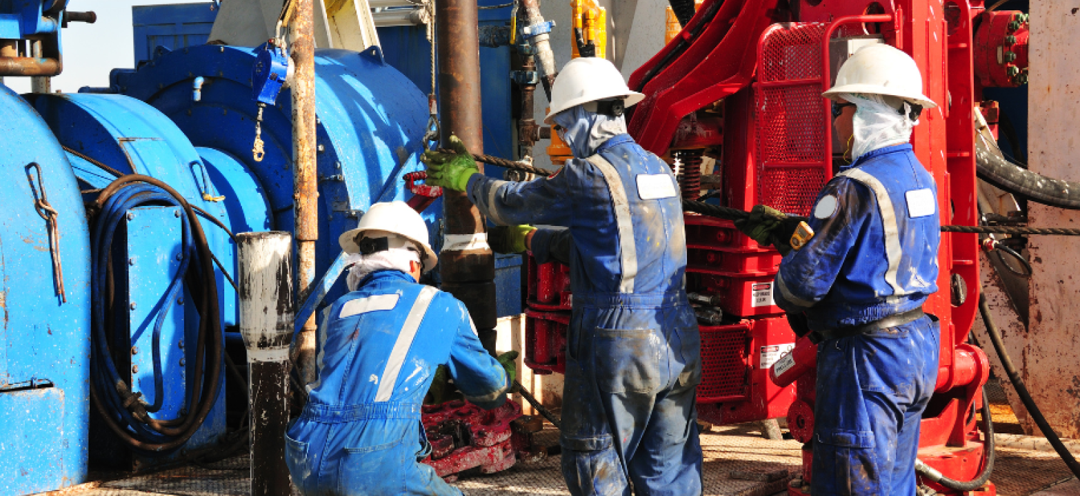 oil workers working on platform - rising oil prices